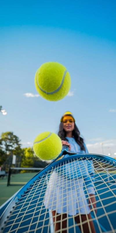 woman-in-black-jacket-and-black-pants-holding-tennis-racket-under-blue-sky-during-daytime.jpg woman in black jacket and black pants holding tennis racket under blue sky during daytime